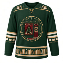 Load image into Gallery viewer, Ugly Christmas Cozy Bookshop Noel Hockey Jersey in Library Green, front view – gold-ringed starry crest with a little bookshop window glowing with a Christmas tree, piles of books, string lights and a red door with a wreath, stacked-book yoke, gold-striped open-book elbow bands and a gold book-spine hem band with tiny trees – custom name and number