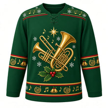 Load image into Gallery viewer, Ugly Christmas Brass Band Carols Hockey Jersey in Pine Green, front view – pine green body with a music-staff yoke with free-standing art of a gold trumpet, trombone and tuba with a holly sprig, star and music notes, plus french horn, jingle bell and note bands – custom name and number