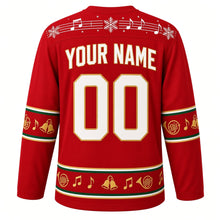 Load image into Gallery viewer, Ugly Christmas Brass Band Carols Hockey Jersey in Royal Red, back view with a music-staff yoke, french horn, jingle bell and note sleeve and hem bands, arched YOUR NAME lettering and 00 – custom name and number