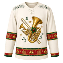 Load image into Gallery viewer, Ugly Christmas Brass Band Carols Hockey Jersey in Ivory White, front view – ivory white body with a music-staff yoke with free-standing art of a gold trumpet, trombone and tuba with a holly sprig, star and music notes, plus french horn, jingle bell and note bands – custom name and number