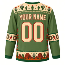 Load image into Gallery viewer, Ugly Christmas Desert Cactus Christmas Hockey Jersey in Saguaro Green, back view with a Santa-hat cactus and star yoke, chili and wreath sleeve bands, a cactus and mesa hem band, cream YOUR NAME and 00 outlined in red – your name and number