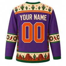 Load image into Gallery viewer, Ugly Christmas Desert Cactus Christmas Hockey Jersey in Twilight Purple, back view with a cream Santa-hat cactus yoke with orange trim, chili and wreath sleeve bands, a cactus and mesa hem band, cream YOUR NAME and orange 00 – your name and number