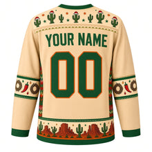 Load image into Gallery viewer, Ugly Christmas Desert Cactus Christmas Hockey Jersey in Desert Sand, back view with a Santa-hat cactus yoke, chili and wreath sleeve bands, a saguaro and mesa hem band, green YOUR NAME and 00 – your name and number