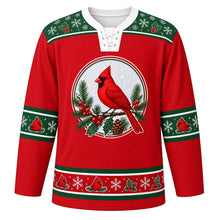 Load image into Gallery viewer, Ugly Christmas Cardinal Snowfall Hockey Jersey in Cranberry Red, front view – cranberry red body with green holly-and-snowflake yoke with a round crest of a red cardinal on a snowy pine branch with berries, holly and a pinecone, plus round-cardinal, snowflake and holly bands – custom name and number