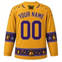 Load image into Gallery viewer, Ugly Christmas Caroling Choir Hockey Jersey in Candlelight Gold, back view with a music note and bell yoke, lantern and note sleeve bands, songbook hem band, arched YOUR NAME lettering and 00 – custom name and number