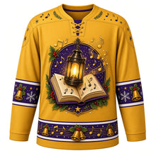 Load image into Gallery viewer, Ugly Christmas Caroling Choir Hockey Jersey in Candlelight Gold, front view – candlelight gold body and gold yoke with purple bands with a round lantern-and-songbook crest with golden music notes and brass bells, note-and-bell yoke, lantern sleeve bands and a songbook hem band – custom name and number