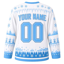 Load image into Gallery viewer, Ugly Christmas Ice Castle Kingdom Hockey Jersey in Frost White, back view with a pale blue icicle yoke with snowflakes, ice-turret sleeve bands, a blue icicle and snowflake hem band, sky blue YOUR NAME and 00 – your name and number