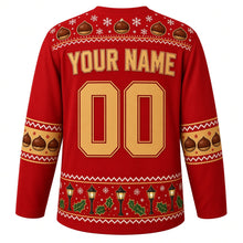 Load image into Gallery viewer, Ugly Christmas Roasted Chestnut Cart Hockey Jersey in Ember Red, back view with a chestnut-and-snowflake yoke, chestnut sleeve bands, a street lamp and holly hem band, YOUR NAME lettering and 00 – custom name and number