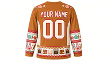 Load image into Gallery viewer, Ugly Christmas Cookie Bake-Off Hockey Jersey in Cinnamon Brown, back view with an iced-cookie yoke, apron and cookie-cutter sleeve bands, oven hem band, arched YOUR NAME lettering and 00 – custom name and number