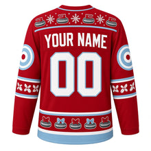 Load image into Gallery viewer, Ugly Christmas Curling Stone Cheer Hockey Jersey in Cranberry Red, back view with a festive snowflake yoke, holly and broom sleeve bands, a hem band of curling stones wearing bows, arched YOUR NAME lettering and 00 – custom name and number