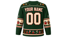 Load image into Gallery viewer, Ugly Christmas Cozy Fireplace Hockey Jersey in Spruce Green, back view with a flame-and-candle yoke, mug, candle and log sleeve bands, fireplace-and-mug hem band, arched YOUR NAME lettering and 00 – custom name and number