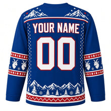 Load image into Gallery viewer, Ugly Christmas Mountain Goat Summit Hockey Jersey in Alpine Blue, back view with a snowy mountain-peak yoke with stars, goat-head sleeve bands, a pine and mountain-range hem with a red zigzag stripe, YOUR NAME and 00 – your name and number