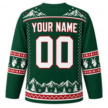 Load image into Gallery viewer, Ugly Christmas Mountain Goat Summit Hockey Jersey in Pine Green, back view with a white snowy-peak yoke, red and white goat-head sleeve bands, a snowy pine-forest hem with a red zigzag band, YOUR NAME and 00 – your name and number