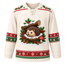 Load image into Gallery viewer, Ugly Christmas Hedgehog Holly Hideaway Hockey Jersey in Snow Cream, front view – snow cream body with a holly-patterned yoke with a brown hedgehog in a twig nest under a snowy hollow log with holly, red berries, acorns and red toadstools, plus hedgehog and acorn bands – custom name and number