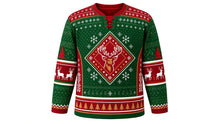 Load image into Gallery viewer, Ugly Christmas Reindeer Riot Hockey Jersey in Evergreen Green, front view – evergreen green body with red yoke, side panels and collar – laced V-neck, fair-isle shoulder yoke, antlered reindeer-head crest, pine side panels, reindeer elbow bands and a pine-tree hem stripe band – custom name and number