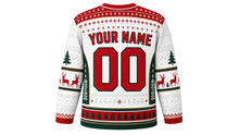 Load image into Gallery viewer, Ugly Christmas Reindeer Riot Hockey Jersey in Snow White, back view – snow white body with red yoke and green side panels – a fair-isle yoke, patterned side panels and sleeve bands, a pine-tree hem stripe band, arched YOUR NAME lettering and a big 00 number – custom name and number