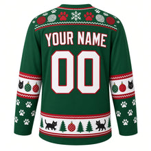 Load image into Gallery viewer, Ugly Christmas Kitty Ornament Chaos Hockey Jersey in Pine Green, back view with a paw-print, yarn-ball and snowflake yoke, cat-face and bauble sleeve bands, paw-print sleeves, a cats-trees-and-ornaments hem band, arched YOUR NAME lettering and 00 – custom name and number