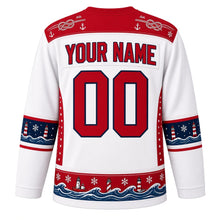 Load image into Gallery viewer, Ugly Christmas Snowy Lighthouse Coast Hockey Jersey in Snowdrift White, back view with a red rope-knot and anchor yoke, navy snowflake and lighthouse sleeve bands, a red wave hem band, red YOUR NAME and 00 – your name and number