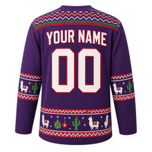 Load image into Gallery viewer, Ugly Christmas Festive Llama Fiesta Hockey Jersey in Sugarplum Purple, back view with a zigzag woven-blanket yoke, llama and cactus sleeve bands, a llama, cactus and ornament hem band, arched YOUR NAME lettering and 00 – custom name and number