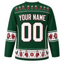 Load image into Gallery viewer, Ugly Christmas Mitten Clothesline Hockey Jersey in Evergreen, back view with a mini mitten clothesline yoke, white mitten sleeve bands, a white hem band of pinned mittens and holly, white YOUR NAME and 00 – your name and number
