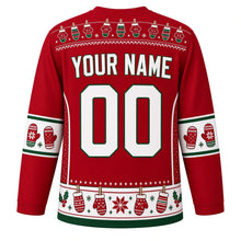 Load image into Gallery viewer, Ugly Christmas Mitten Clothesline Hockey Jersey in Cranberry Red, back view with a mini mitten clothesline yoke, white sleeve bands with mitten pairs, a white hem band of pinned mittens and a snowflake star, white YOUR NAME and 00 – your name and number