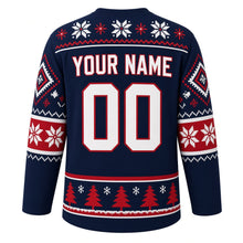 Load image into Gallery viewer, Ugly Christmas Nordic Star Pattern Hockey Jersey in Midnight Navy, back view with a snowflake yoke, red snowflake sleeve bands, a hem band of red pixel pines and white snowflakes, arched YOUR NAME lettering and 00 – custom name and number