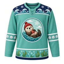 Load image into Gallery viewer, Ugly Christmas Sea Otter Snowfall Hockey Jersey in Seafoam Mint, front view – seafoam mint body, round chest crest of a sea otter floating on its back in a red pom-pom hat holding a starfish, deep navy wave and snowflake yoke, scallop shell sleeve bands and a kelp and bubble hem – custom name and number