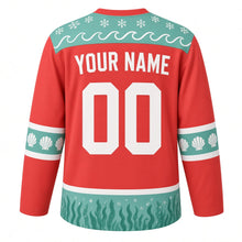 Load image into Gallery viewer, Ugly Christmas Sea Otter Snowfall Hockey Jersey in Coral Red, back view with seafoam mint wave and snowflake yoke, scallop shell sleeve bands and a kelp and bubble hem band, arched YOUR NAME and 00 – your name and number