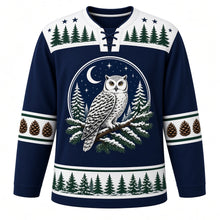 Load image into Gallery viewer, Ugly Christmas Snowy Owl Woods Hockey Jersey in Midnight Navy, front view – midnight navy body with icy white yoke with a round owl crest on a snowy pine branch under a crescent moon, pine-tree-and-star yoke, pinecone sleeve bands and a pine-tree hem band – custom name and number