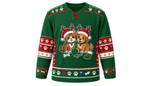 Load image into Gallery viewer, Ugly Christmas Pawsitively Festive Hockey Jersey in Pine Green, front view – pine green body with a round cartoon cat-and-dog crest in Santa hats and antlers with yarn, bone and stocking, paw-print yoke, paw and stocking sleeve bands and a paw-print hem band – custom name and number