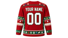 Load image into Gallery viewer, Ugly Christmas Pawsitively Festive Hockey Jersey in Cranberry Red, back view with a paw-print and bone yoke, paw and stocking sleeve bands, paw-print hem band, arched YOUR NAME lettering and 00 – custom name and number