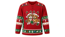 Load image into Gallery viewer, Ugly Christmas Pawsitively Festive Hockey Jersey in Cranberry Red, front view – cranberry red body with a round cartoon cat-and-dog crest in Santa hats and antlers with yarn, bone and stocking, paw-print yoke, paw and stocking sleeve bands and a paw-print hem band – custom name and number