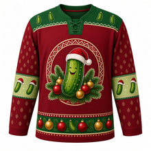 Load image into Gallery viewer, Ugly Christmas Christmas Pickle Hunt Hockey Jersey in Cranberry Red, front view – round red zigzag-ringed crest of a smiling pickle in a Santa-style hat nestled in pine sprigs with red and gold baubles on a cranberry red body, green yoke dotted with little pickles, pickle elbow bands and a green bauble-and-pickle hem band – custom name and number