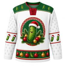 Load image into Gallery viewer, Ugly Christmas Christmas Pickle Hunt Hockey Jersey in Snowy White, front view – round red zigzag-ringed crest of a smiling pickle in a Santa-style hat nestled in pine sprigs with red and gold baubles on a snowy white body, green yoke of little pickles, white sleeves with red-striped pickle elbow bands and a green bauble hem band – custom name and number