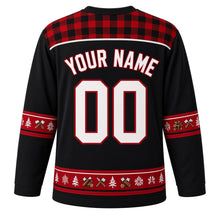 Load image into Gallery viewer, Ugly Christmas Plaid Lumberjack Cabin Hockey Jersey in Midnight Black, back view with a buffalo-check plaid yoke, pine, axe and log sleeve and hem bands, arched YOUR NAME lettering and 00 – custom name and number