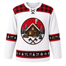Load image into Gallery viewer, Ugly Christmas Plaid Lumberjack Cabin Hockey Jersey in Snow White, front view – snow white body with red-and-black buffalo-check yoke with a round snowy log cabin crest with smoking chimney, pines, crossed axes and stacked firewood, plus woodland bands of pines, axes, logs and snowflakes – custom name and number