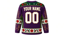 Load image into Gallery viewer, Ugly Christmas Poinsettia Bloom Hockey Jersey in Plum Purple, back view with a poinsettia and holly yoke, blossom sleeve bands with gold swirls, poinsettia hem band, arched YOUR NAME lettering and 00 – custom name and number