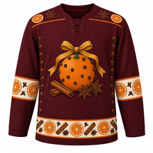 Load image into Gallery viewer, Ugly Christmas Pomander Orange Spice Hockey Jersey in Mulled Burgundy, front view – a clove-studded orange pomander tied with a gold ribbon bow above cinnamon sticks and star anise, orange slice and star anise yoke, cream orange-slice elbow bands with gold trim, clove columns and a cream orange slice, cinnamon and anise hem band – custom name and number