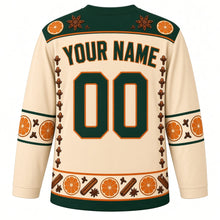 Load image into Gallery viewer, Ugly Christmas Pomander Orange Spice Hockey Jersey in Clove Cream, back view with a green orange slice and star anise yoke, clove columns, green orange-slice sleeve bands, a green-trimmed spice hem band, green YOUR NAME and 00 – your name and number