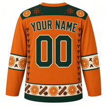 Load image into Gallery viewer, Ugly Christmas Pomander Orange Spice Hockey Jersey in Spice Orange, back view with a green orange slice and star anise yoke, clove columns, cream orange-slice sleeve bands, a green-trimmed spice hem band, green YOUR NAME and 00 – your name and number