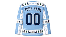 Load image into Gallery viewer, Ugly Christmas Frozen Pond Skate Hockey Jersey in Ice Blue, back view with a skate, pine and snowflake yoke, stick and puck sleeve bands, skate hem band, arched YOUR NAME lettering and 00 – custom name and number