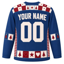 Load image into Gallery viewer, Ugly Christmas Quilted Patchwork Noel Hockey Jersey in Denim Blue, back view with a red and cream quilt-square yoke, red tree sleeve bands, cream stitched YOUR NAME and 00 and a tree, heart and star patchwork hem band – your name and number