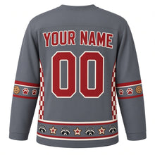 Load image into Gallery viewer, Ugly Christmas Raccoon Cookie Heist Hockey Jersey in Slate Gray, back view with red checkerboard side panels, red-striped cookie and paw print sleeve bands, a raccoon-face and star cookie hem band, red YOUR NAME and 00 – your name and number