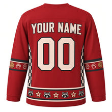 Load image into Gallery viewer, Ugly Christmas Raccoon Cookie Heist Hockey Jersey in Berry Red, back view with black checkerboard side panels, black-striped cookie and paw print sleeve bands, a raccoon-face hem band, cream YOUR NAME and 00 – your name and number