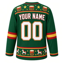 Load image into Gallery viewer, Ugly Christmas Rocking Horse Toybox Hockey Jersey in Evergreen, back view with a toy drum and star yoke, a hem band of little rocking horses, drums and blocks, arched YOUR NAME lettering and 00 – custom name and number