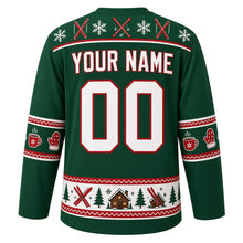 Load image into Gallery viewer, Ugly Christmas Ski Lodge Apres Hockey Jersey in Spruce Green, back view with a yoke of skis, poles and snowflakes, cocoa-mug and mitten sleeve bands, a skis-pines-and-cabins hem band, arched YOUR NAME lettering and 00 – custom name and number