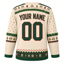 Load image into Gallery viewer, Ugly Christmas Sloth Tinsel Hangout Hockey Jersey in Vanilla Cream, back view with a green-trimmed sloth-face yoke with green tinsel swag, green tinsel sleeve bands, a red zigzag and green sloth hem band, green YOUR NAME and 00 – your name and number