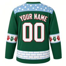 Load image into Gallery viewer, Ugly Christmas Snowball Fight Frenzy Hockey Jersey in Pine Green, back view with a light blue snowball yoke, red and green mitten sleeve bands, a white snow-brick hem, YOUR NAME and 00 – your name and number