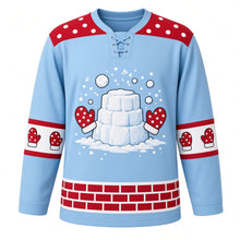 Load image into Gallery viewer, Ugly Christmas Snowball Fight Frenzy Hockey Jersey in Ice Blue, front view – snow-block fort with flying snowballs and red polka-dot mittens, red snowball polka-dot yoke, mitten sleeve bands and a red brick hem band – custom name and number
