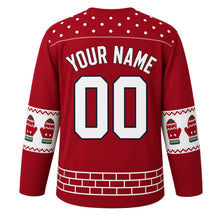 Load image into Gallery viewer, Ugly Christmas Snowball Fight Frenzy Hockey Jersey in Cranberry Red, back view with a snowball polka-dot yoke, knit mitten sleeve bands, a white snow-brick hem, YOUR NAME and 00 – your name and number